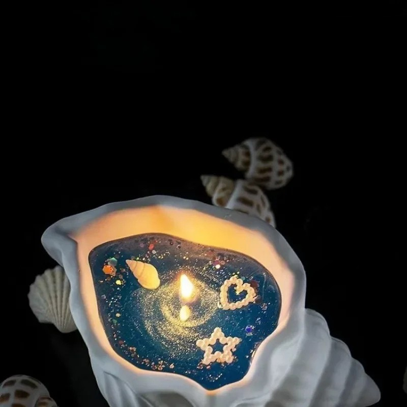 Aromatherapie-Duftkerze mit Muschelmotiv