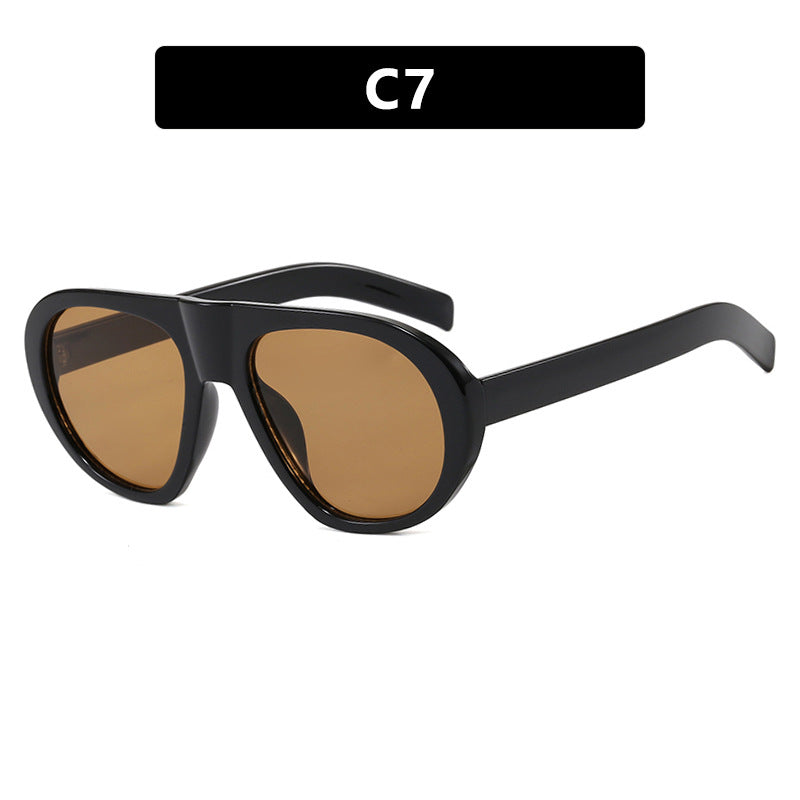 Damen auffällige Sonnenbrille mit futuristischem Rahmen und robustem Design Karnz