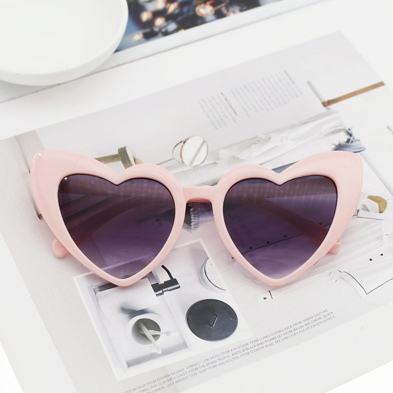 Damen Herzförmige Sonnenbrille mit glitzerndem Rahmen Karnz
