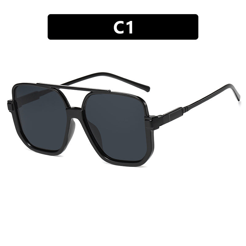 Damen quadratische Sonnenbrille mit transparentem Rahmen und grün getönten Gläsern Karnz