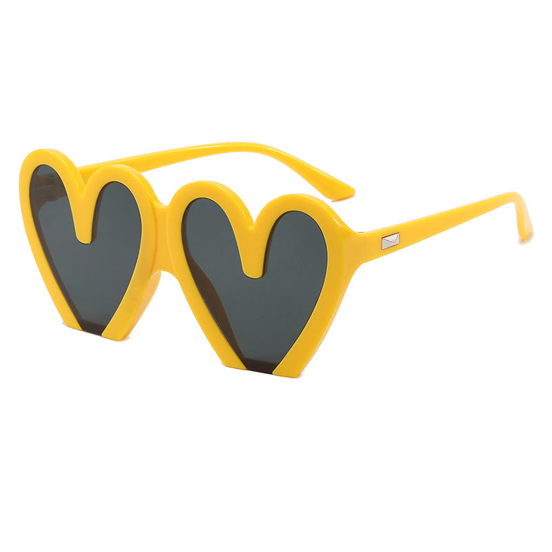 Damen Herzförmige Sonnenbrille mit auffälligem Design Karnz