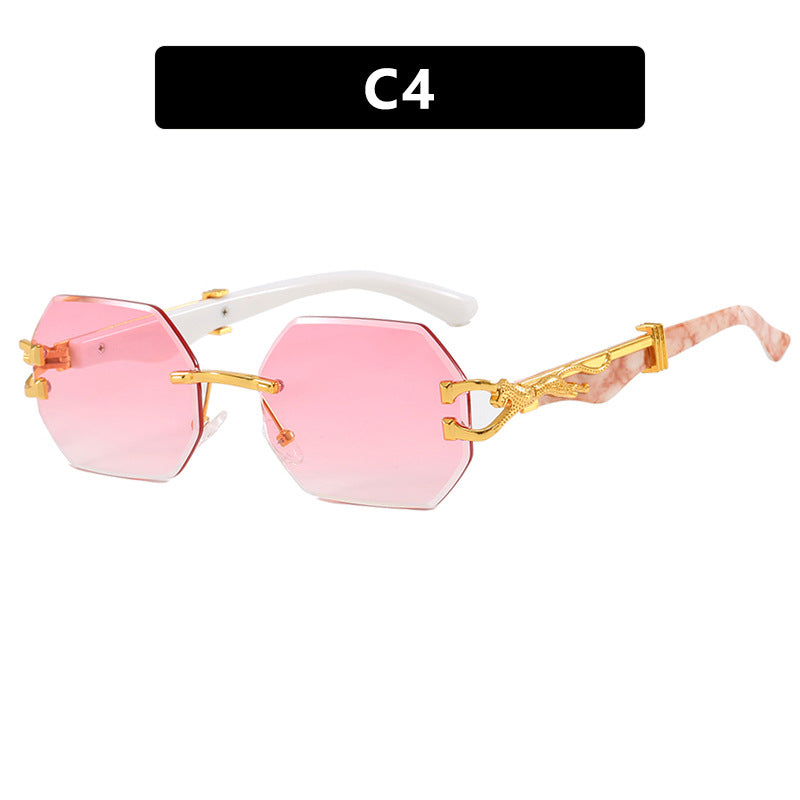 Damen modische Sonnenbrille mit extravagantem achteckigem Design und goldenen Akzenten Karnz