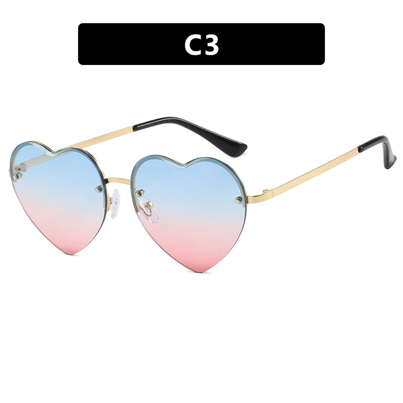 Damen Herzförmige Sonnenbrille mit verspiegelten Gläsern und modischem Metallrahmen Karnz