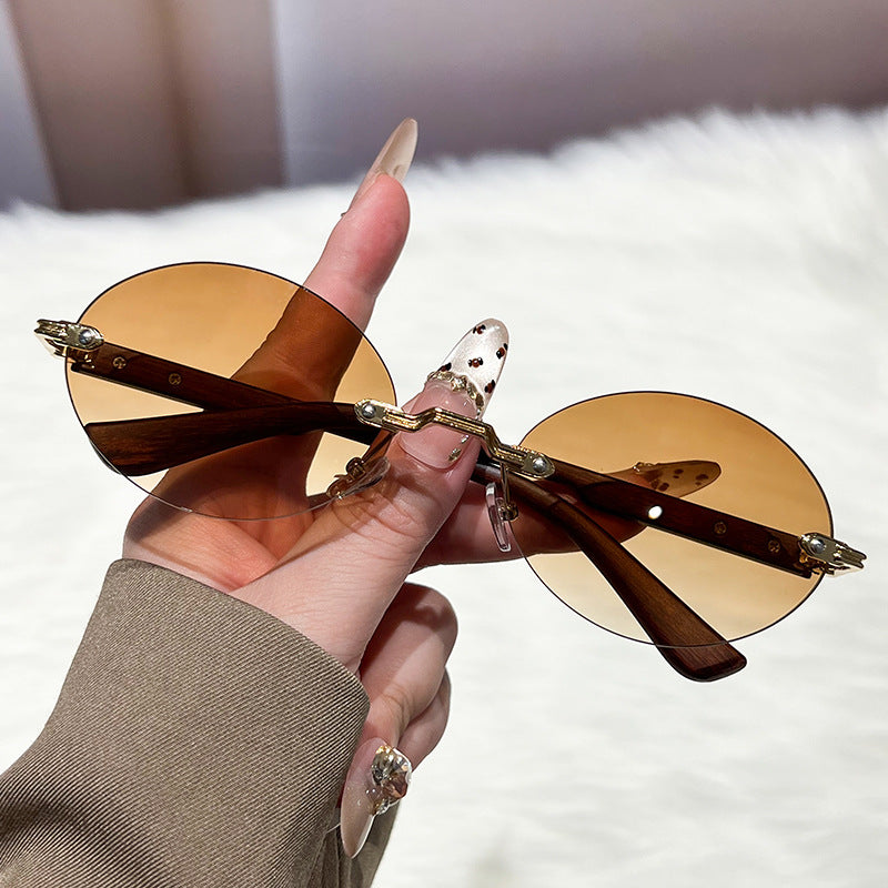 Damen modische und elegante Sonnenbrille mit ovalem Design Karnz