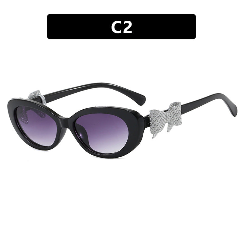 Damen modische Sonnenbrille mit verspieltem Schleifen-Design Karnz