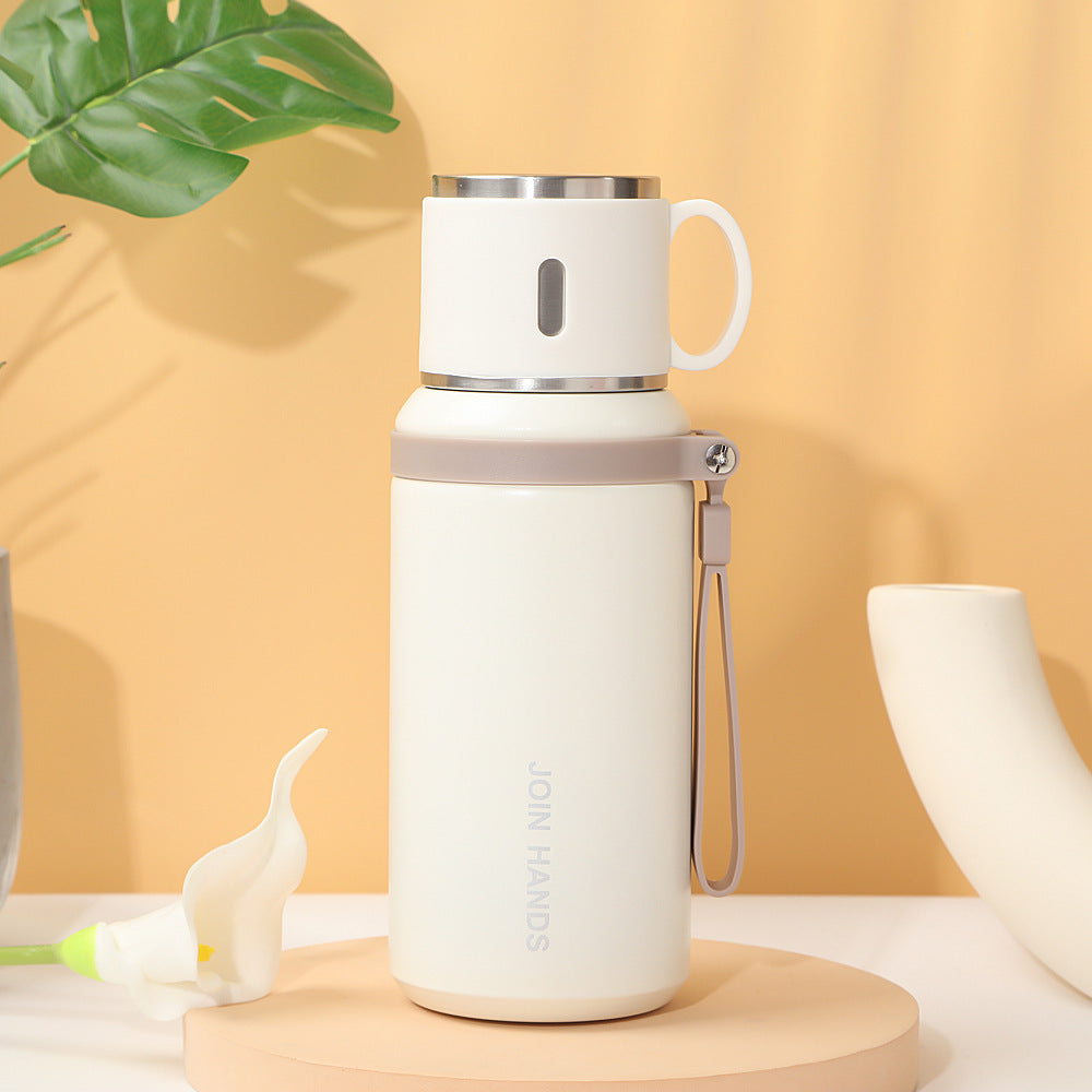Damen isolierte Edelstahl-Trinkflasche mit ausklappbarem Becher Karnz