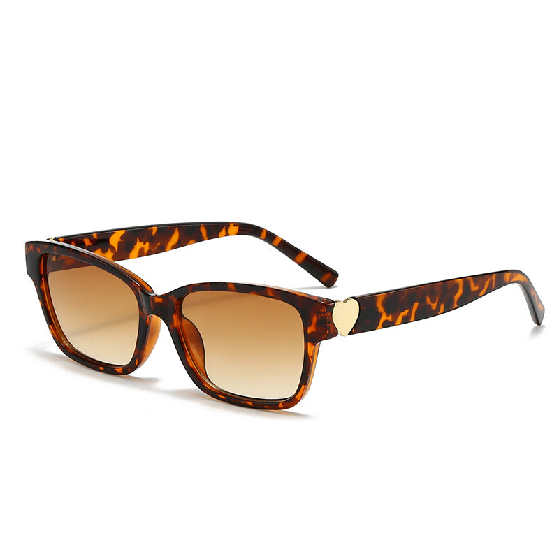 Damen modische quadratische Sonnenbrille mit Herz-Akzenten Karnz