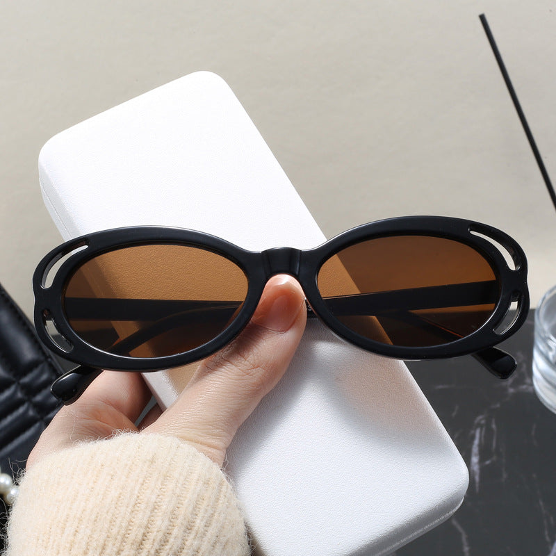 Damen modische Sonnenbrille mit ovalem Rahmen und einzigartigem Design Karnz