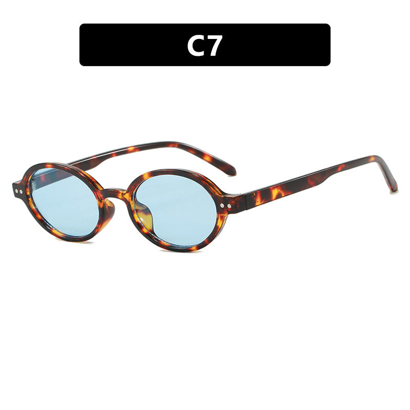 Damen modische ovalförmige Sonnenbrille mit ausgefallenem Rahmen Karnz