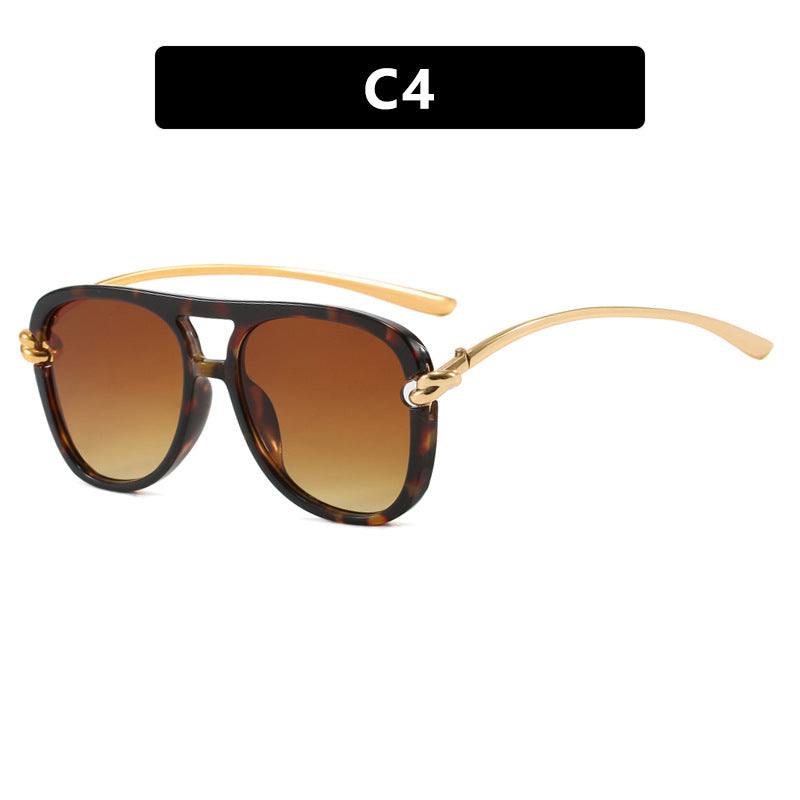 Damen sportliche Sonnenbrille mit breitem Kunststoffrahmen und UV-Schutz Karnz
