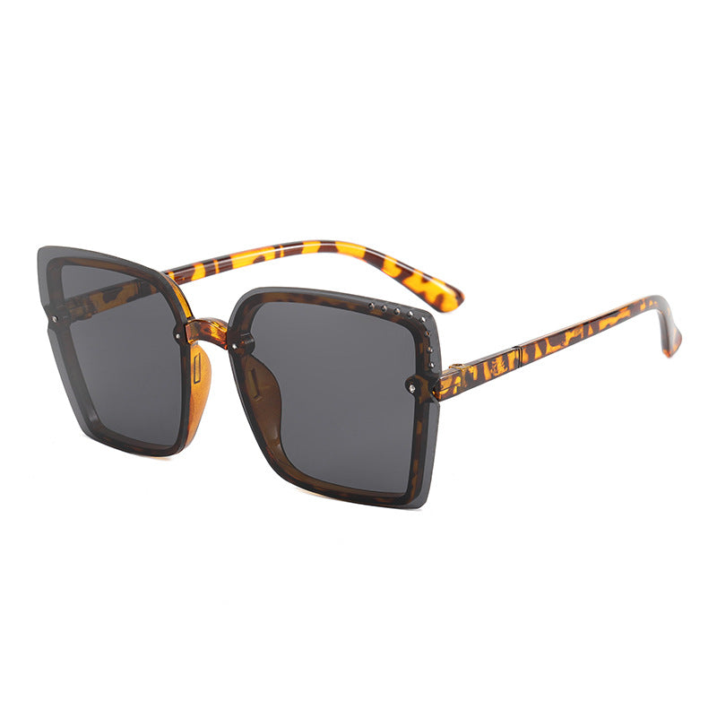 Damen Quadratische Sonnenbrille mit funkelnden Rahmenakzenten Karnz