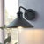 Moderner minimalistischer Kegel-Eisen 1-Lampe Wandleuchte für Außenpatio | Karnz