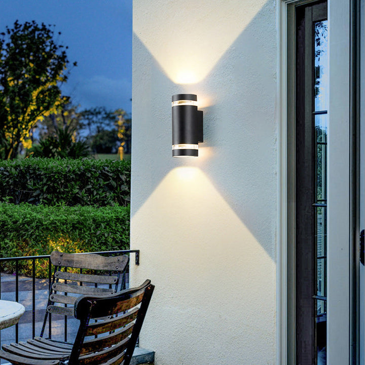 Zeitgenössischer industrieller wasserdichter Aluminiumzylinder LED Auf- und Abwärts leuchtender Spot-Wandleuchte für den Außenbereich Patio | Karnz