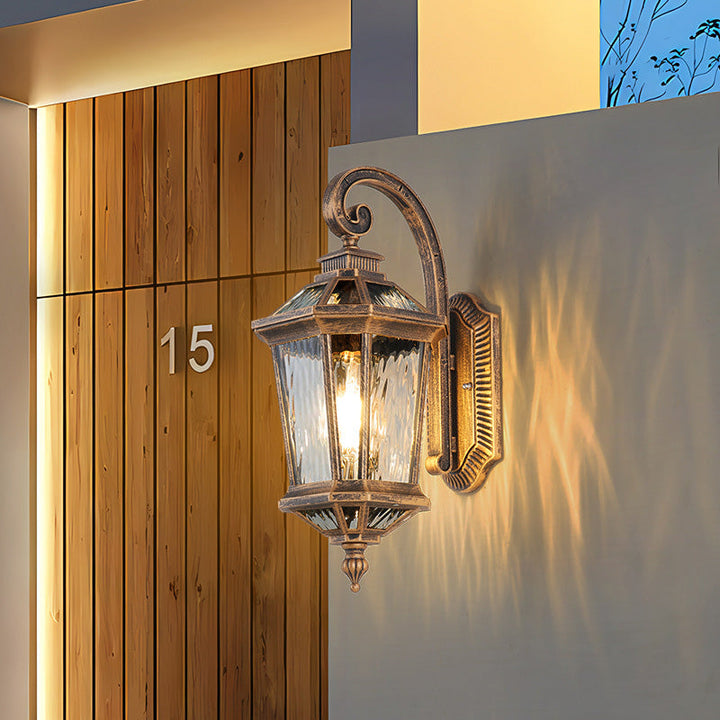 Traditionelle europäische wasserdichte Aluminium-Glas-Oktagon-Zylinder 1-Licht-Wandlampe für den Garten | Karnz