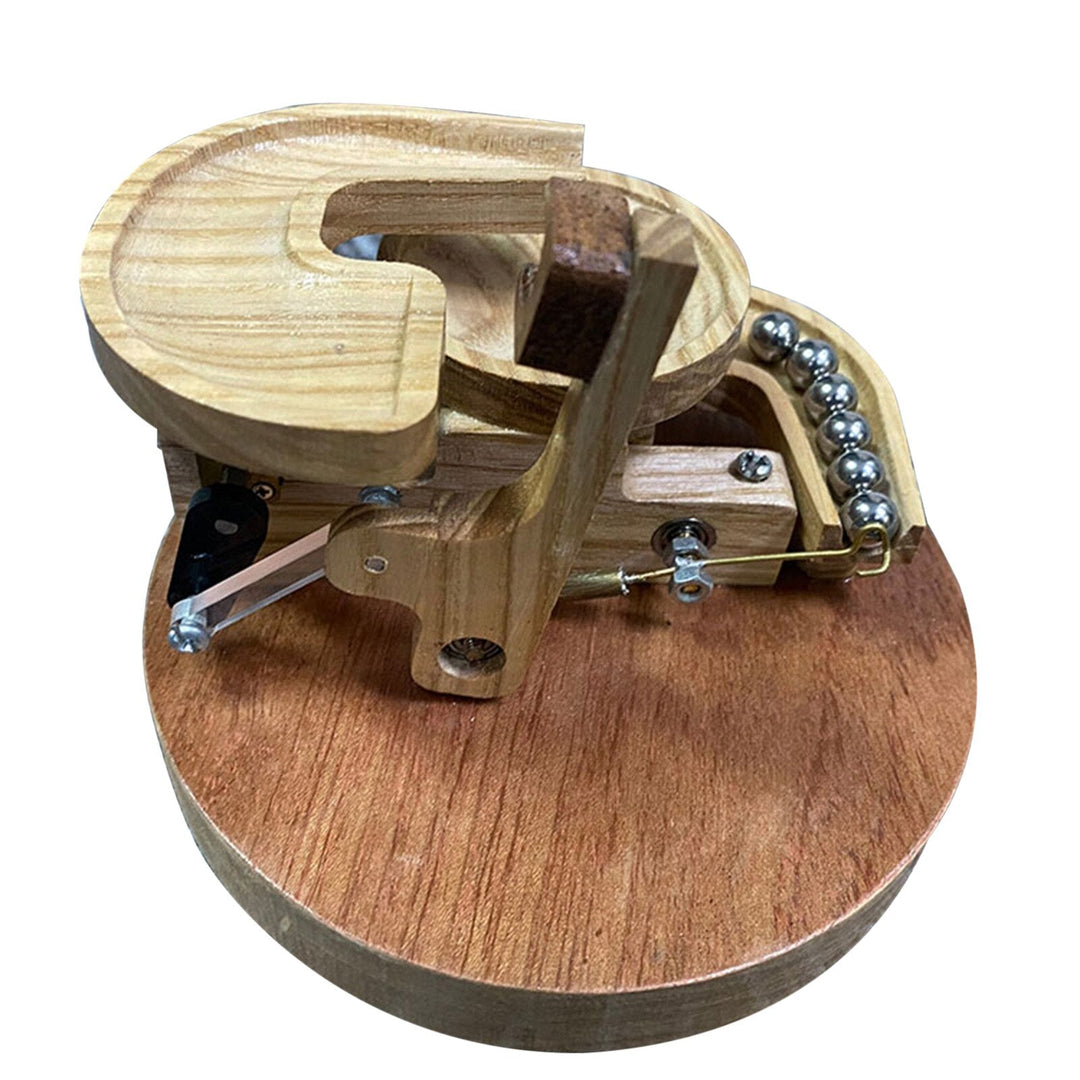 Karnz | Ewige Bewegung Holz-Marmor Maschine