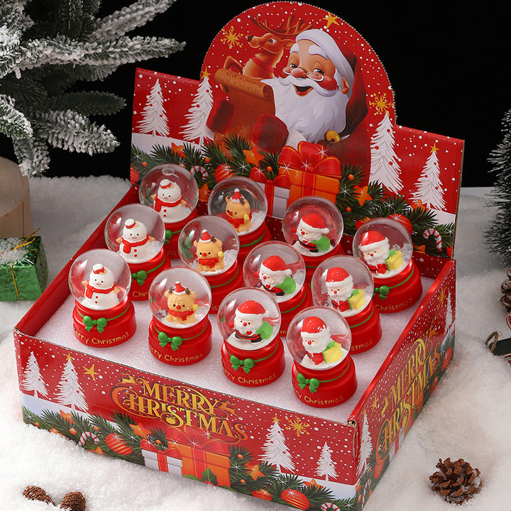 Leuchtende Weihnachts-Schneekugel mit Figuren