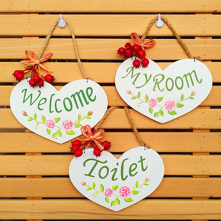 Herzförmiges rustikales Toilettensymbol