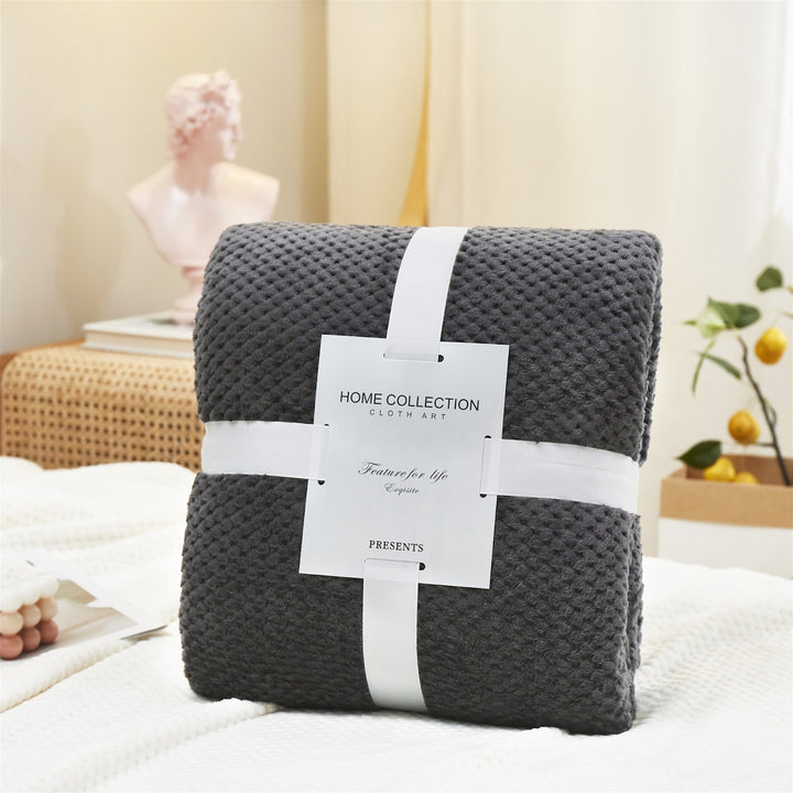 Flauschige Flanell-Decke mit Waffelstruktur