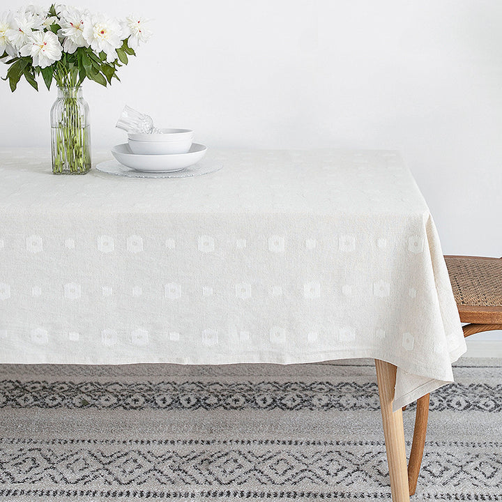 Tischdecke aus Baumwollmix mit geprägtem Quadrat‑ und Kreisrelief Karnz