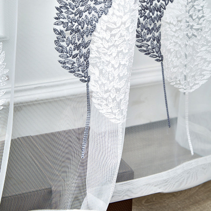 Transparenter Voile‑Vorhang mit besticktem Blattmotiv und Ösenaufhängung Karnz