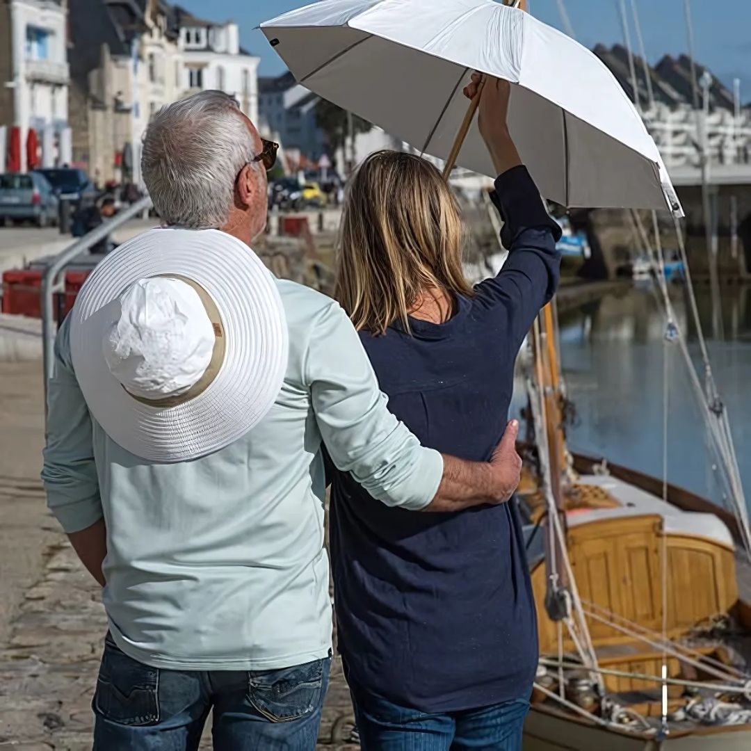 UrbanBrolly | Mini faltbarer Regenschirm UV – Sonnenschutz UPF 50+ – Wasserabweisend – Leicht und taschenfreundlich für die Reise Nutzung Karnz