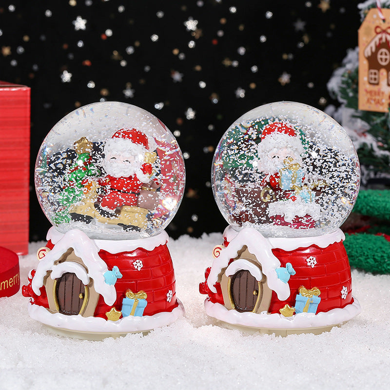 Weihnachts-Schneekugel mit Weihnachtsmann auf Motorrad