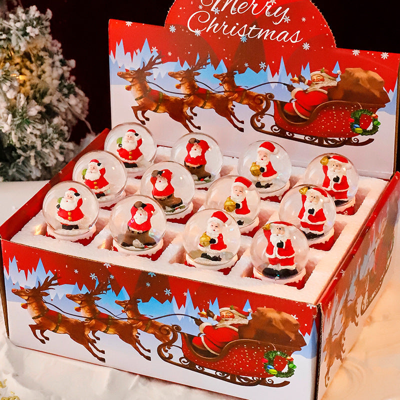Leuchtende Weihnachts-Schneekugel mit Figuren