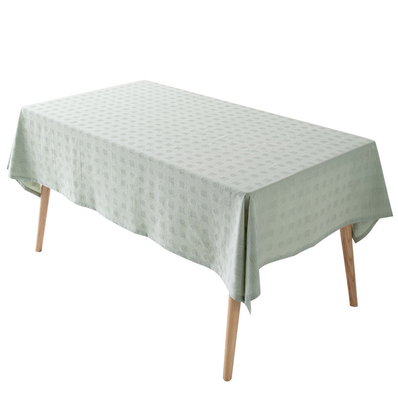Tischdecke aus Baumwollmix mit geprägtem Quadrat‑ und Kreisrelief Karnz