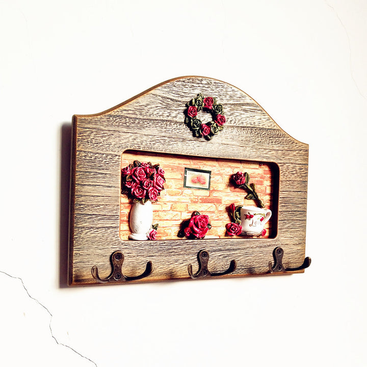 Dekorativer floral Wandhakenregal