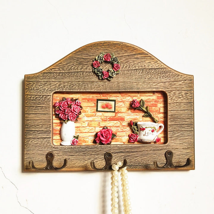 Dekorativer floral Wandhakenregal