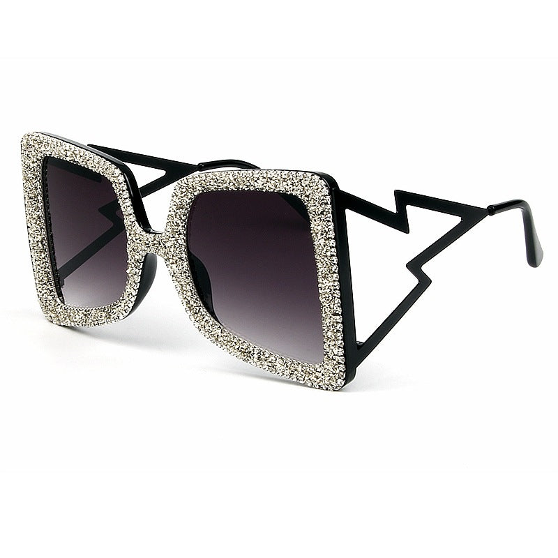 Damen übergroße Sonnenbrille mit glitzerndem Kristallrahmen Karnz