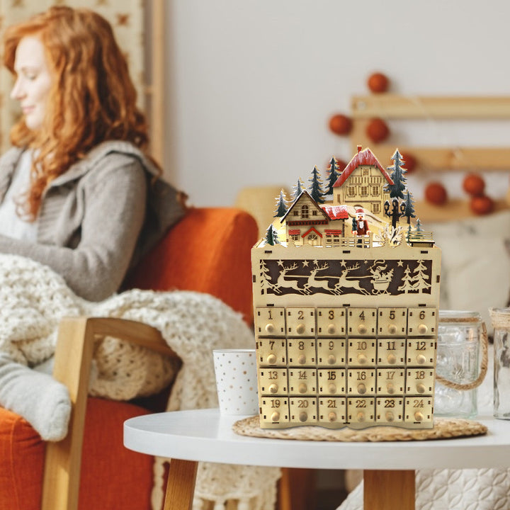Weihnachtlicher Adventskalender aus Holz mit Dorf-Szene