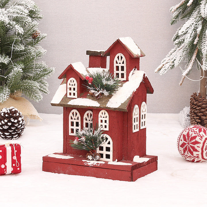 Beleuchtetes rotes Holzhaus, Weihnachtsdekoration