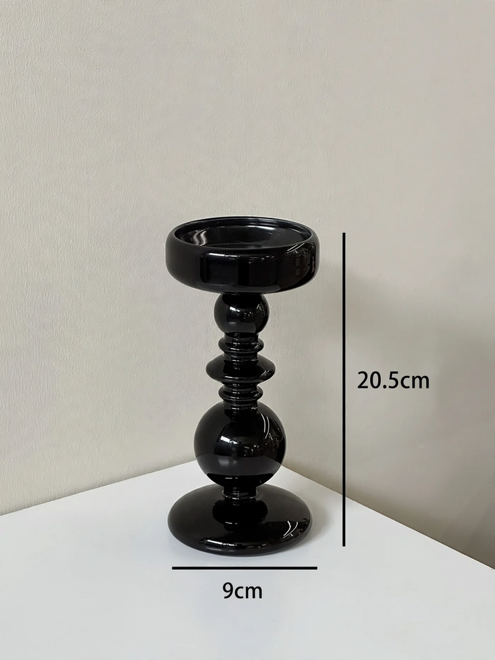 Dekorativer Kerzenhalter aus Glas und Holz
