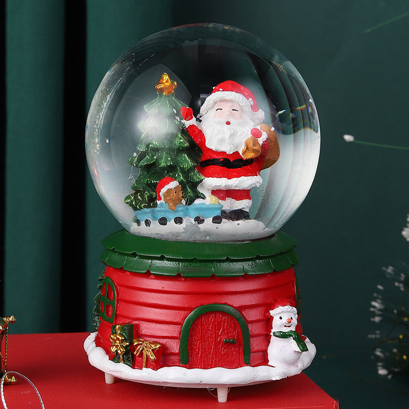 Weihnachtliche Schneekugel mit Musik und Licht