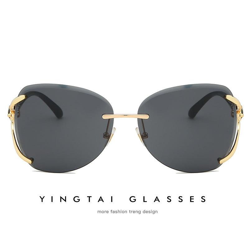 Damen elegante Sonnenbrille mit extravagantem Metallrahmen und verspiegelten Gläsern Karnz