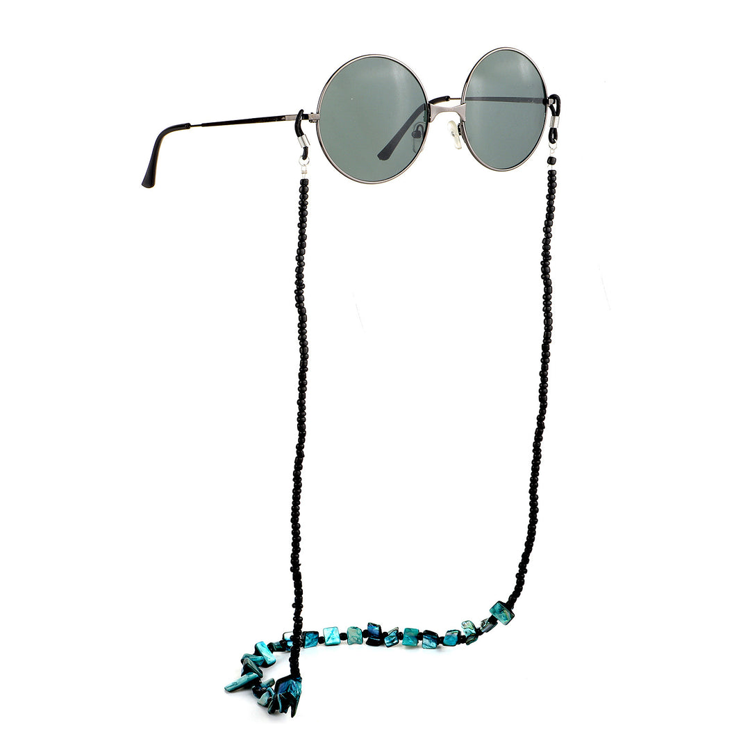 Perlenbrillenhalter mit natürlichen Muschelakzenten Karnz