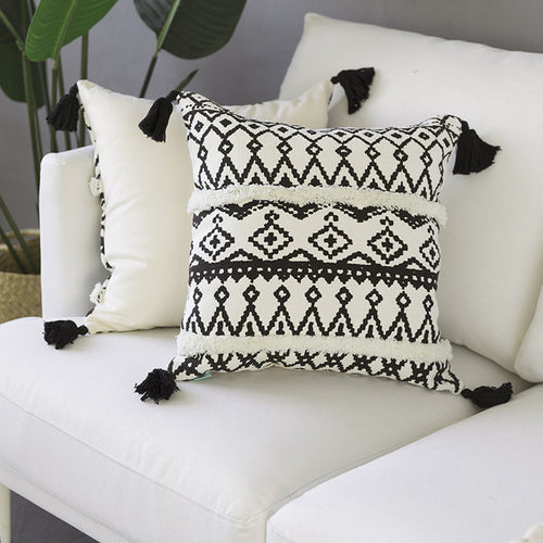 Quadratischer Kissenbezug im Boho-Ethno-Stil mit handtufteten Streifen und Eckquasten