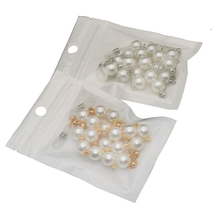 Eleganter Perlenkette Brillenhalter Karnz