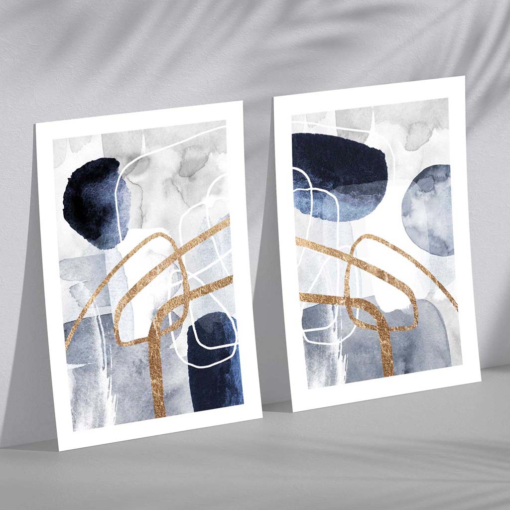 Set mit 2 Kunstdrucken im abstrakten Rahmendesign in Blau und Gold