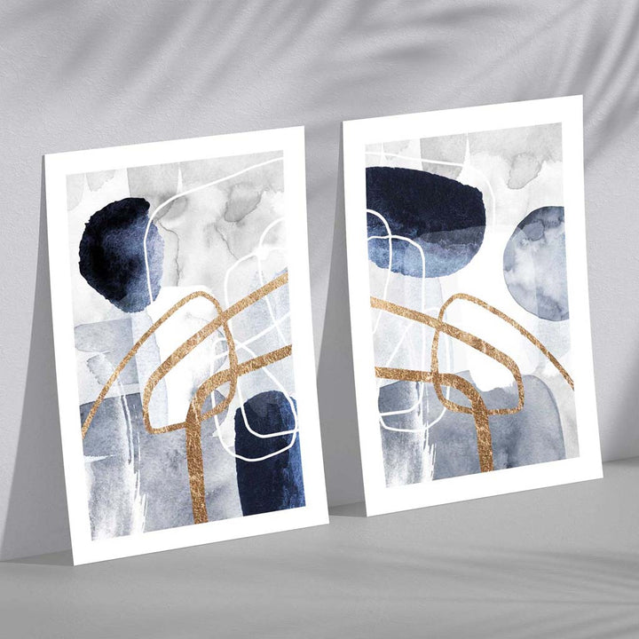 Set aus 2 Kunstdrucken mit abstrakten Formen in Blau und Gold