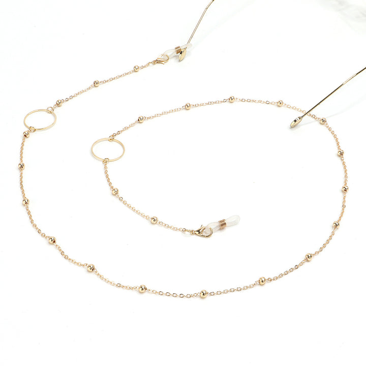 Eleganter goldener Kettenbrillenhalter Karnz