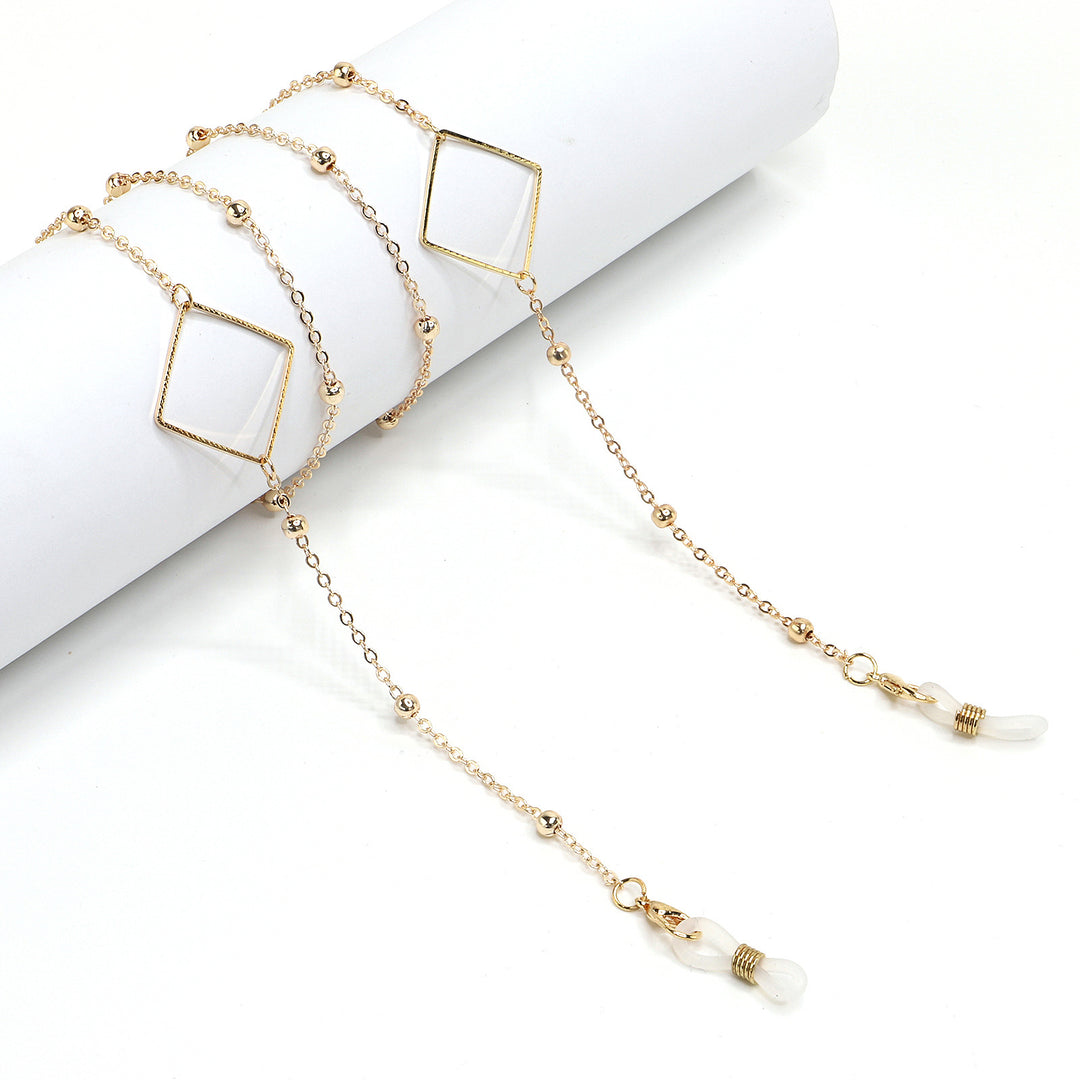 Eleganter goldener Kettenbrillenhalter Karnz