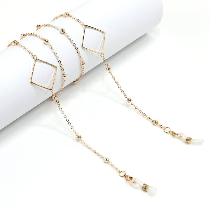 Eleganter goldener Kettenbrillenhalter Karnz