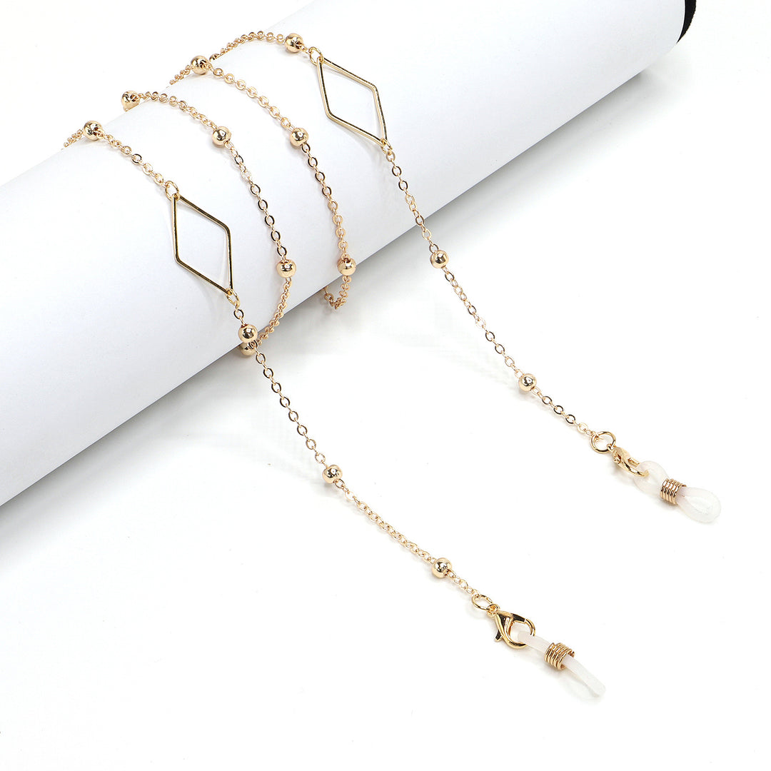 Eleganter goldener Kettenbrillenhalter Karnz
