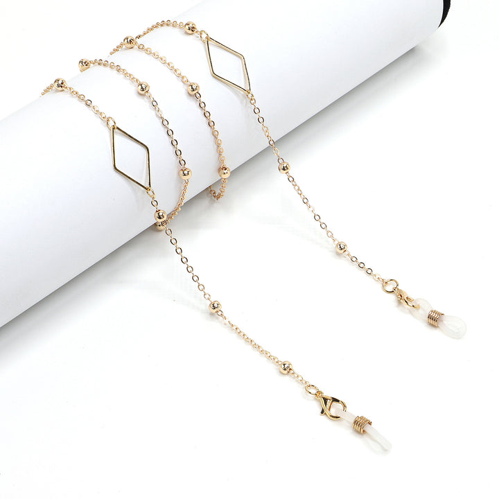 Eleganter goldener Kettenbrillenhalter Karnz