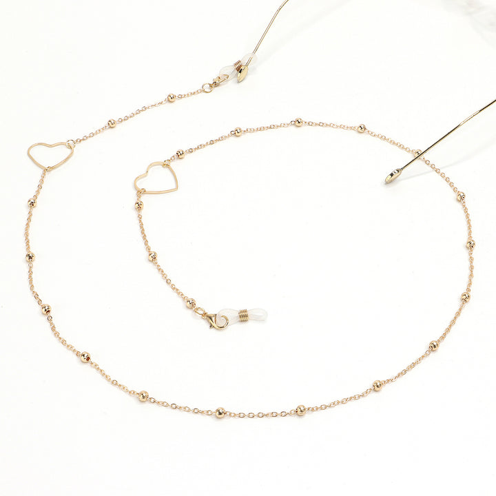 Eleganter goldener Kettenbrillenhalter Karnz