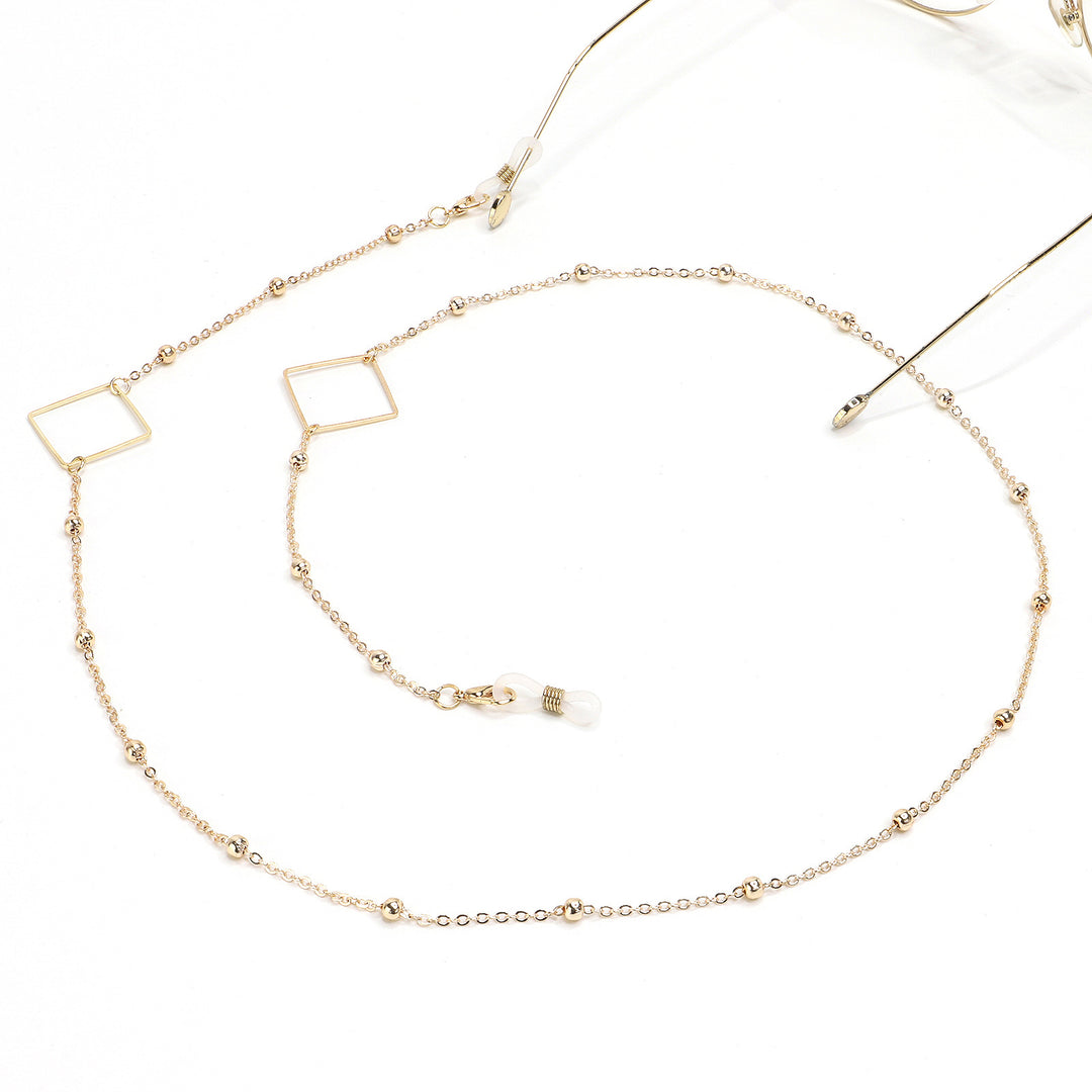 Eleganter goldener Kettenbrillenhalter Karnz