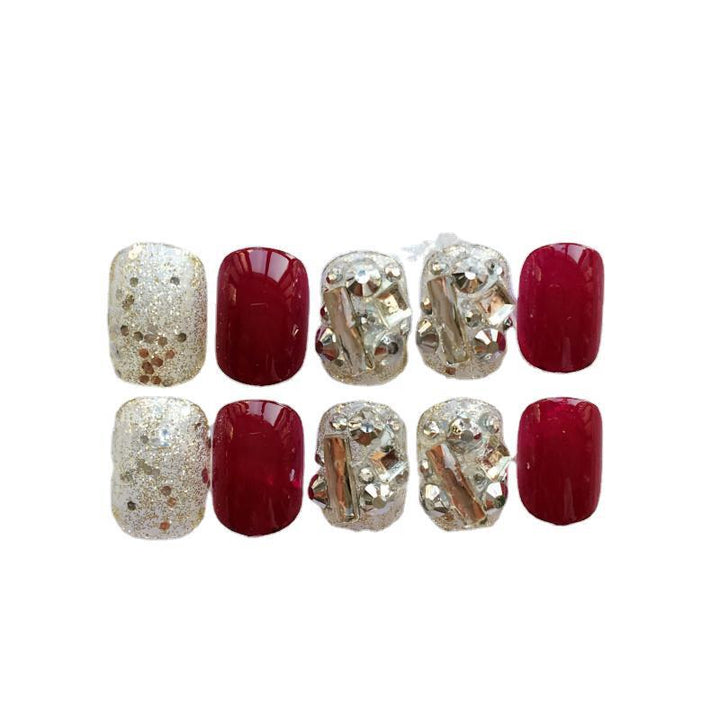 Kunstnägel mit luxuriöser Glitter- und Blumendesign Karnz