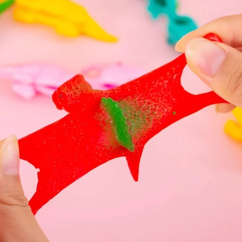 Slingshot Dinosaurier Spielzeuge (Farben zufällig) | Karnz